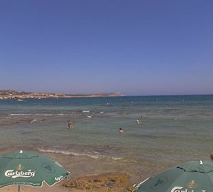 Plaża obok portu,kamienie w wodzie