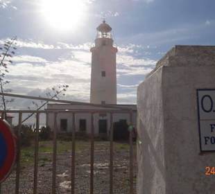 Faro. Leuchtturm, Ausflug mit Roller