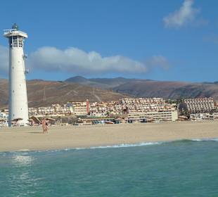 Strand und Leuchtturm