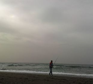 Angler am Strand