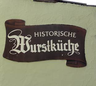 Firmenschild am Gebäude