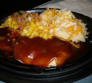 Hähnchenbrust in scharfer Soße