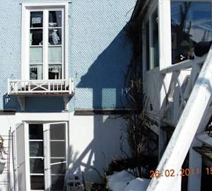Cafe Blaues Haus vom Garten aus