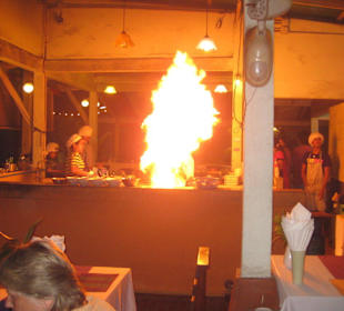 Zubereitung der Speisen in der offenen Küche