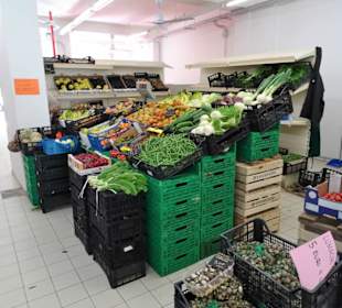 Gemüsehändler in der Markthalle