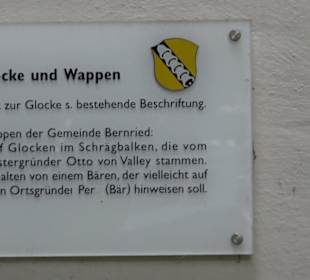 Glocke und Wappen