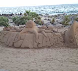 Sandgebilde an der Promenade