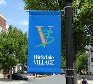 Das Logo des Village