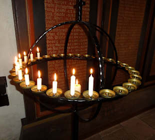 Kerzen in der Kirche St. Firminus