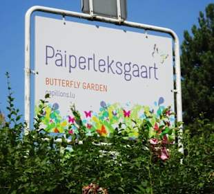 Hinweisschild des Jardin des Papillons