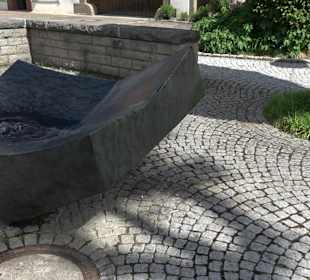 Dorfbrunnen an der Kirche Bittelbronn