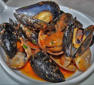 Muscheln in würziger Sugo