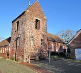 Der Glockenturm der Pogumer Kirche
