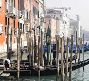 Gondolo's parked at the side of the Canale