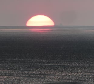 Sonnenuntergang über dem Wattenmeer