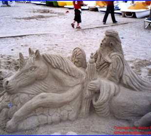 Figur aus Sand gebaut