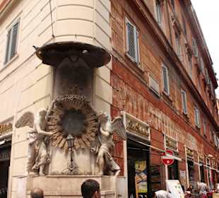 To the right of Trevi Fountain