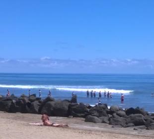 Strand neben Leuchtturm 