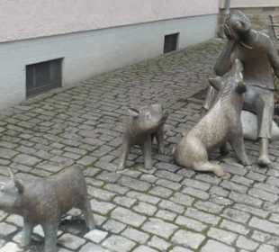Der junge Schweinehirte mit seinen Schweinchen