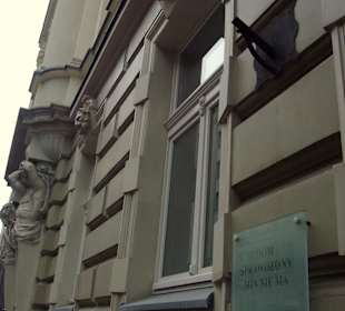 Ulica Wilcza - tablica "sprawdzono - min nie ma"