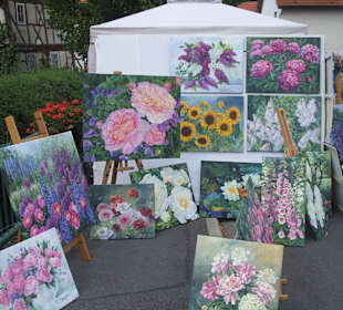 Stand einer Malerin bei der Kunstwoche Kleinsassen