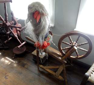 Spinnrad im Rauchhaus des Moorhofes