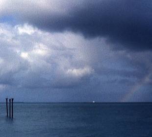 Abschiedsstimmung mit Regenbogen