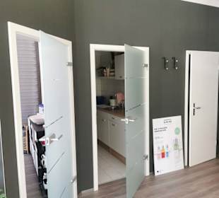 Zu den Behandlungsräumen