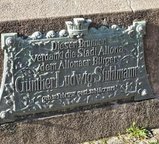 Erinnerung an den Stifter des Brunnens