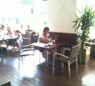 Gast bei Kaffee und Kuchen