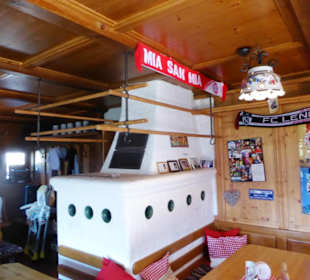Mariandl-Alm - Gastraum, Kachelofen