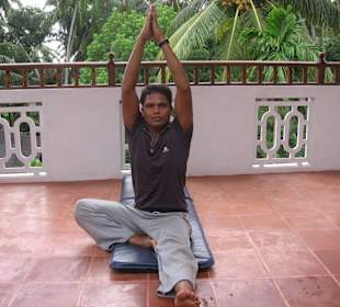 Yoga auf der Dachterrasse
