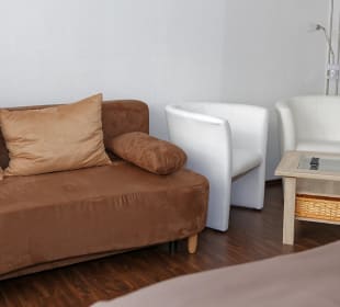 Sitzgelegenheit Dreibettzimmer Hotel Hüttl