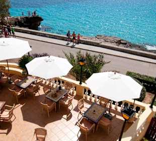 Sicht vom Apartment auf die Terrasse des Lokals