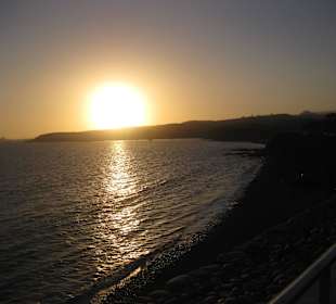 Sonnenuntergang am Ende der Promenade Meloneras