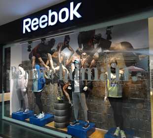 Markengeschäft in der Mall, teurer als bei uns