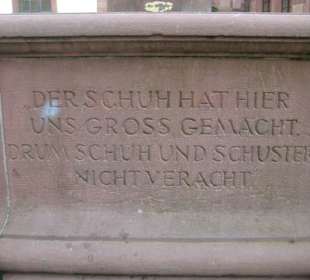 Sinnspruch am Brunnenrand