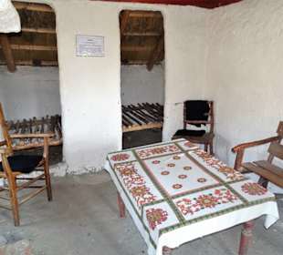 Innenausstattung einer Lehmhütte