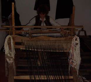 Weberin im Musterhaus