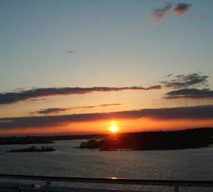 Wschód słońca na promie