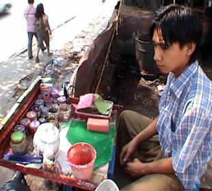 Bettelnußverkäufer