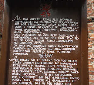 Tablica przy kościele