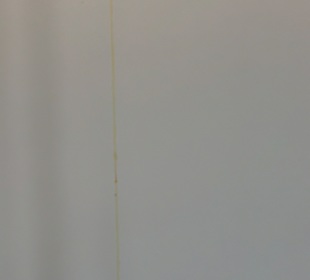 Flüssigkeiten die an der Wand herunterlaufen 