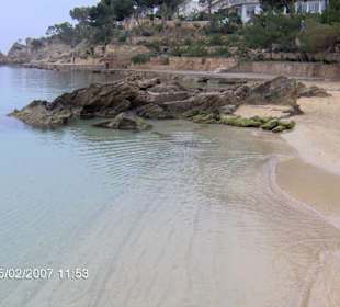 Am Strand von Cala Fornells