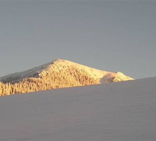 Sonnenaufgang im Schigebiet Salzstiegl