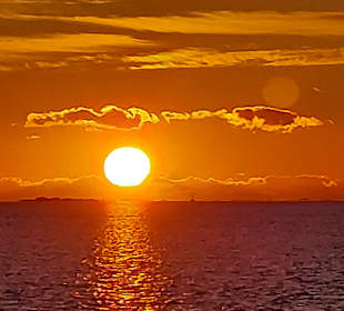 Sonnenuntergang vom Boot