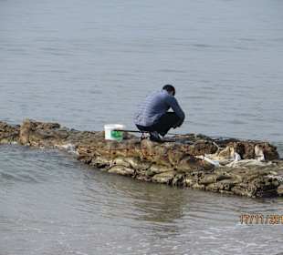 Fischer am Strand
