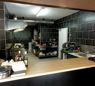 Blick in die offene Küche des Restaurant West