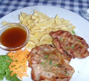 Schweinesteak mit süß-saurer Sauce