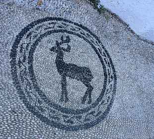 Muster aus kleinen Steinen